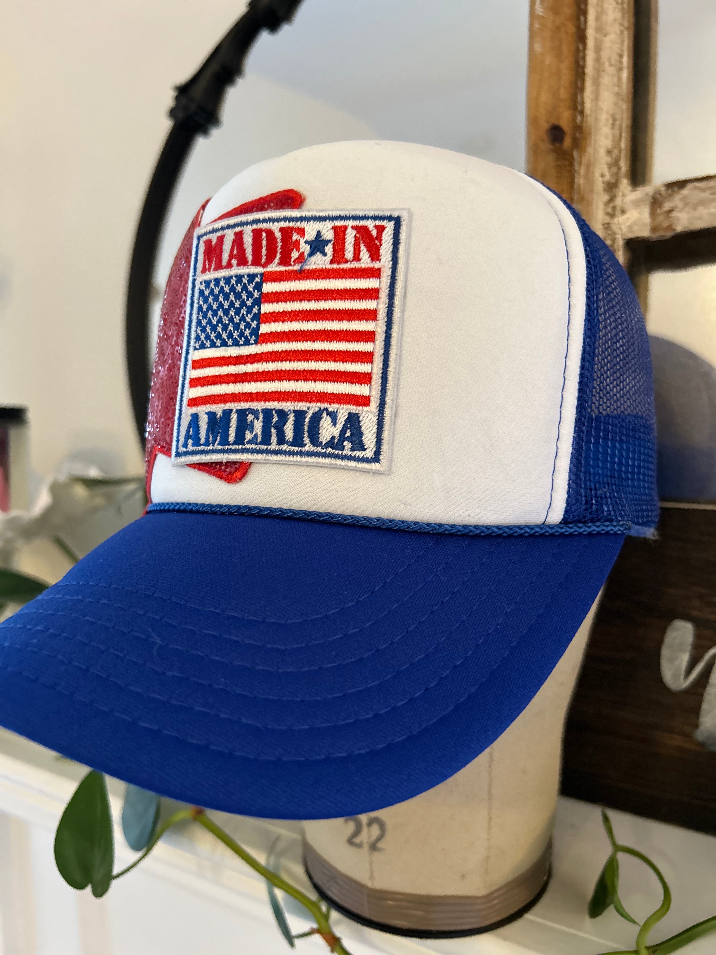 Blue and white trucker hat with 'Made in America' iron on patch