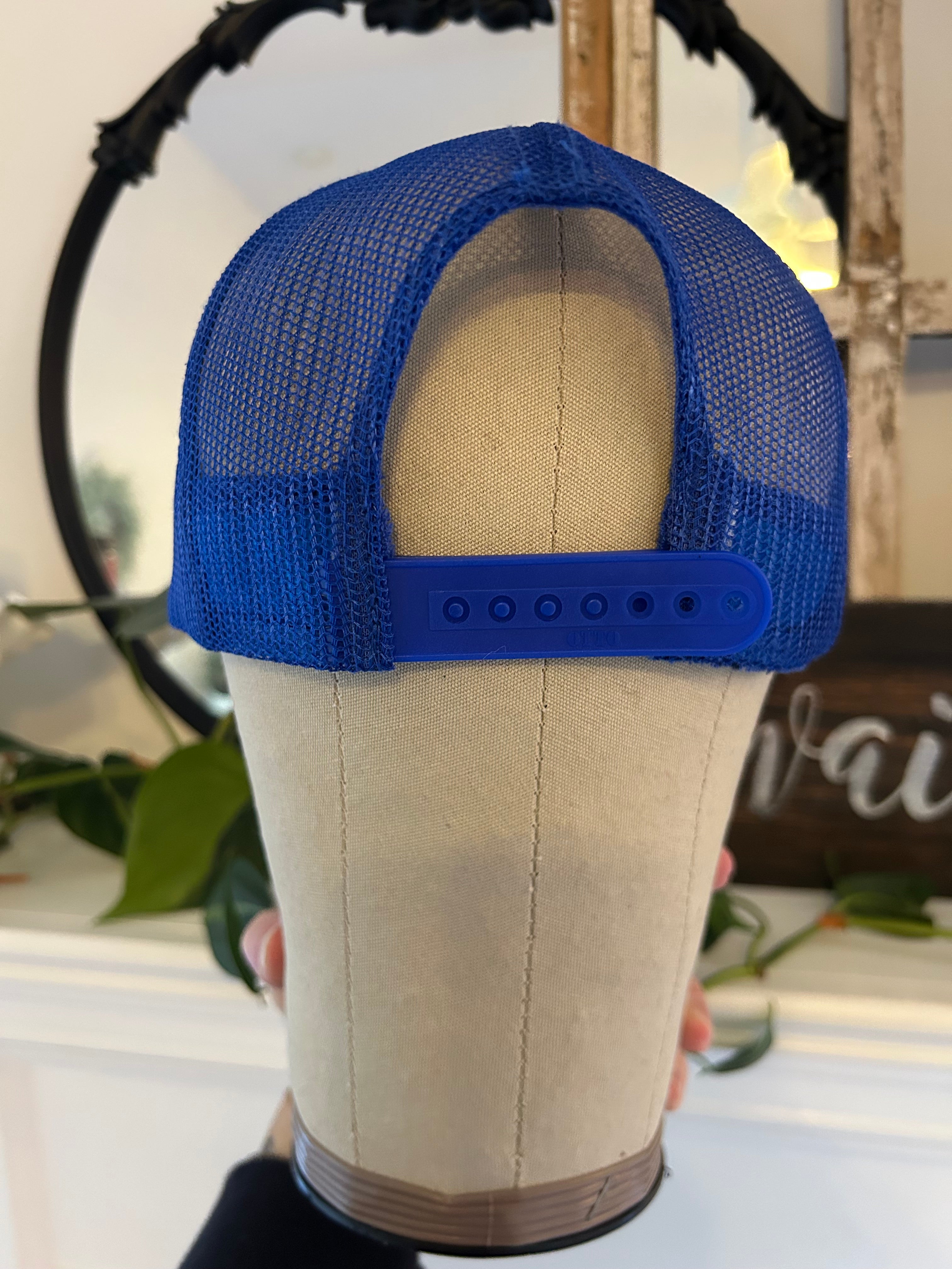 blue and white trucker hat with adjustable back